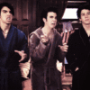 jonas brothers growl in bathrobes