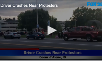 Driver Crashes Near Protesters