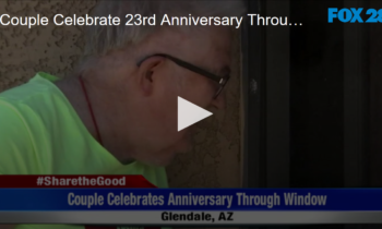 Couple Celebrate 23rd Anniversary Through Window