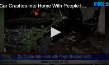 Car Crashes Into Home With People Inside