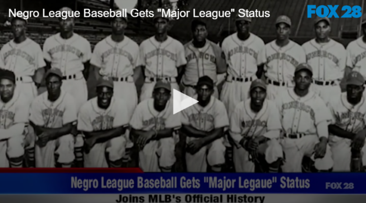 baseball players gathered in a team lineup