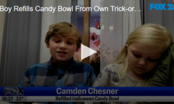 Boy Refills Candy Bowl From Own Trick-or-Treat Bag