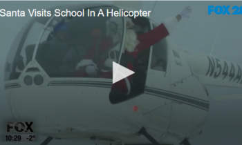 Santa Visits School in a Helicopter