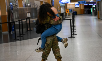 Fairchild Air Force airmen return home from deployment with eager families awaiting