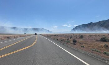 US 243 blocked due to wildland fire, smoke