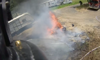 Motorcycle fire leads to small brush fire in North Spokane