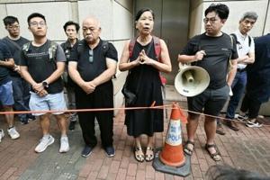 The Hong Kong activist who kept fighting after husband’s arrest