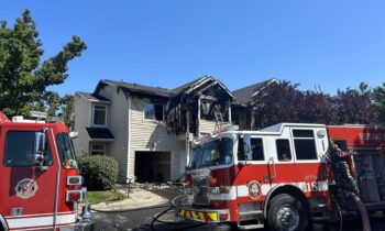 Apartment fire in Neveda neighborhood sends 1 to the hospital