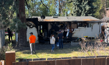 House burns near Ferris High School after neighbors called 911