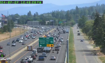 Eastbound I-90 slows near Spokane Valley due to car crash