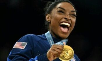 The Latest: Simone Biles and Team USA win women’s gymnastics team gold