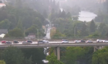 Traffic delays on Maple Street Bridge due to car crash