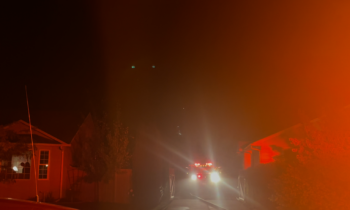 Spokane firefighters contain blaze near homes on North Royal Lane