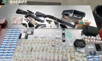 Spokane sheriff’s deputies recover six guns, a thousand pills and cash in car