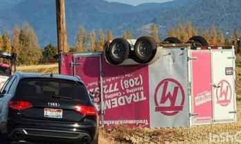 Car crash causes trailer to flip near Rathdrum, no injuries reported