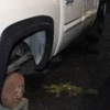 Spokane police arrest burglar suspect attempting to steal tires from parked truck